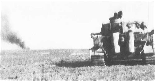 Tiger I, firing at long range.